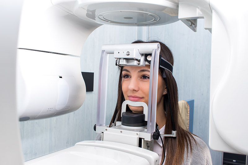 young woman getting a digital x-ray at the dental office