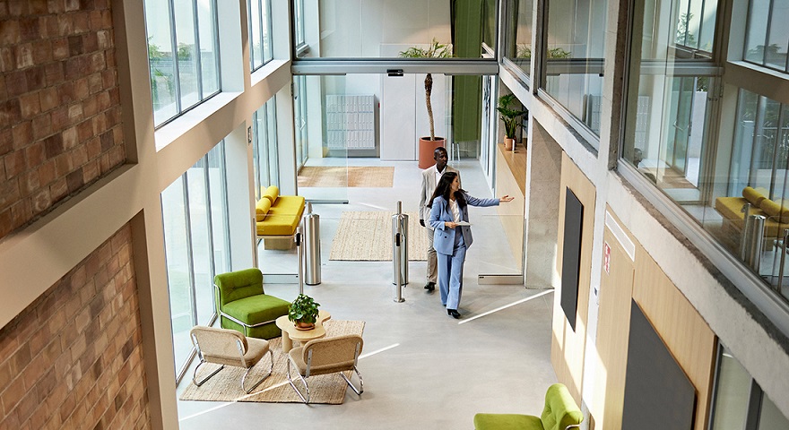 commercial property manager and client looking at a business space, how to choose and fund a business space